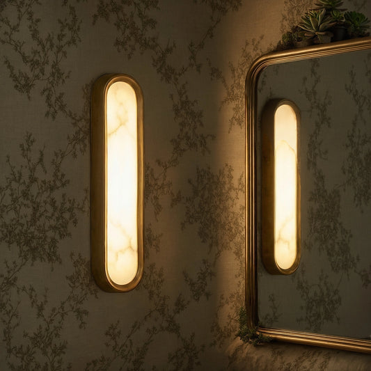 View of an elegant alabaster wall sconce featuring a sculptural design and soft ambient light
