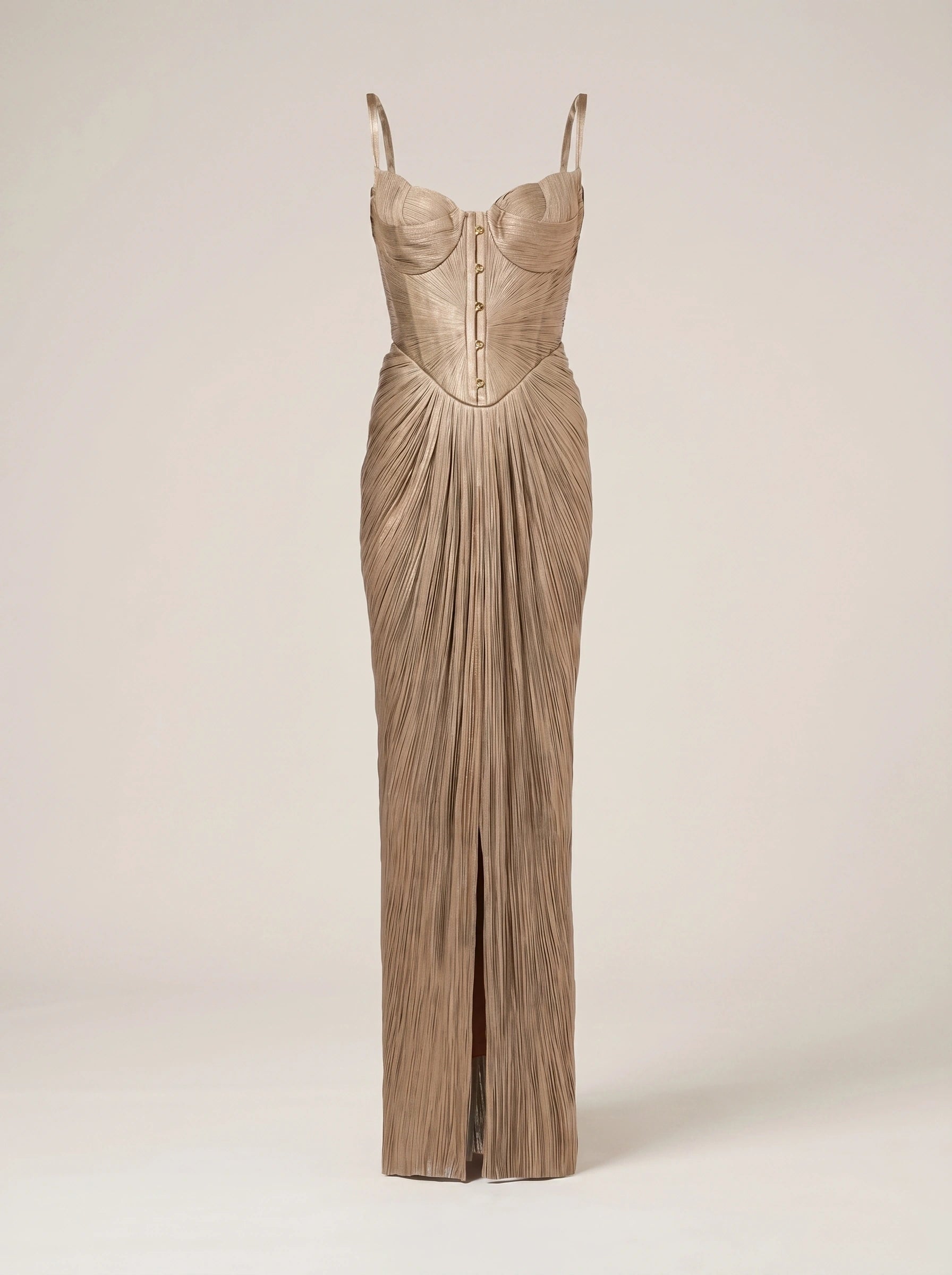 Back view of the Womens Alluring Evening Maxi Dress showing its intricate construction details, flowing silhouette, and Gold against a softly blurred background.