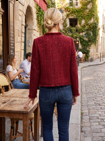 Close up view of the Womens Textured Autumn Jacket showing its intricate fabric texture and meticulous stitching details against a soft neutral background.
