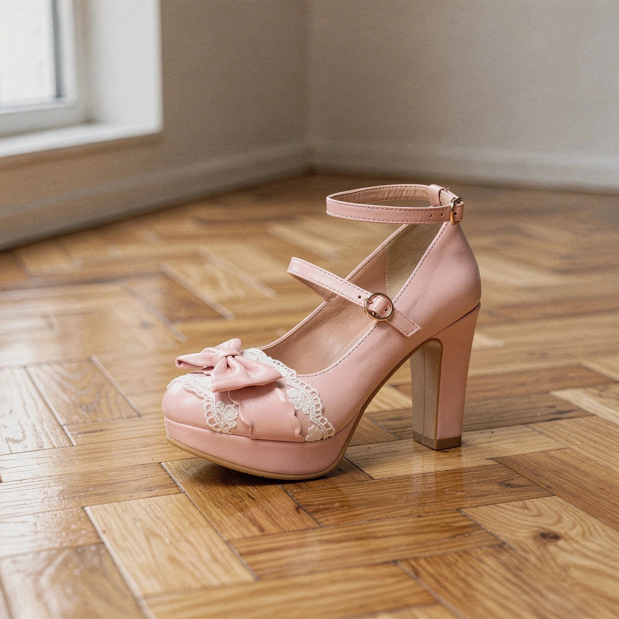 View of elegant high heeled shoes in soft velvet with lace frill detailing, featuring a sleek and stylish silhouette