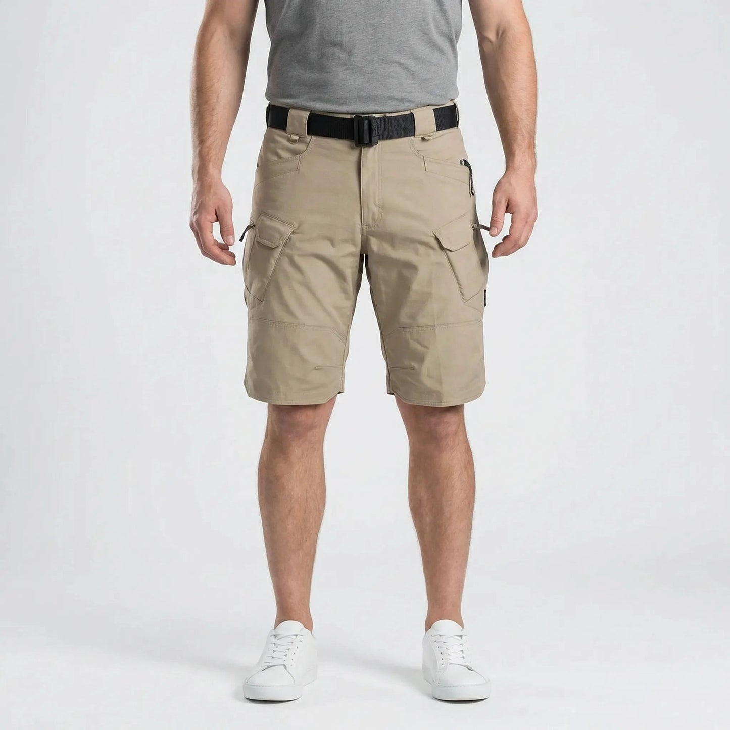 View of durable cargo shorts in khaki, featuring multiple pockets and a relaxed fit for practicality