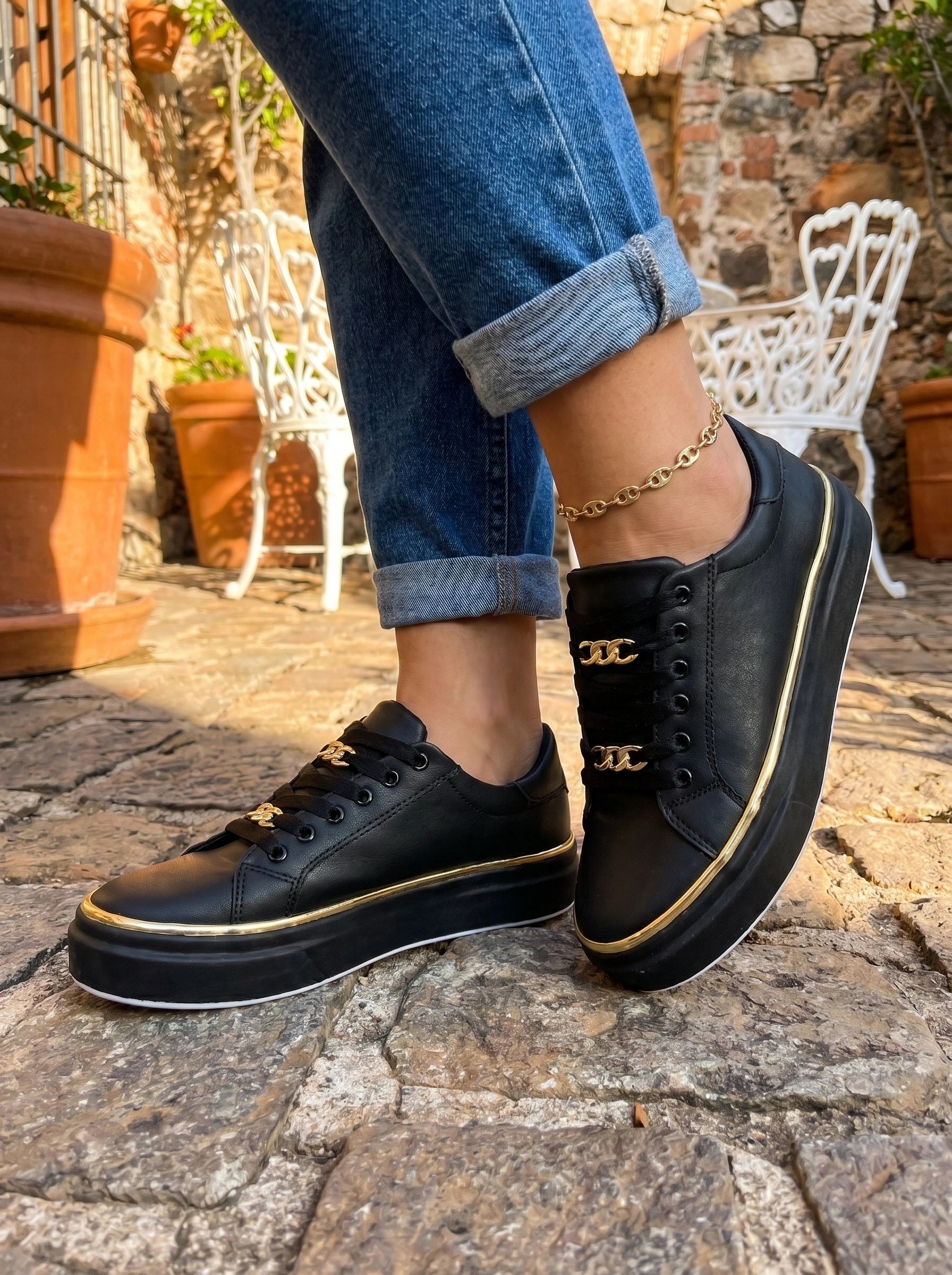Close up view of the Womens Orthopedic Sneakers showing the intricate stitching and breathable fabric in a sleek black design, perfect for everyday wear.