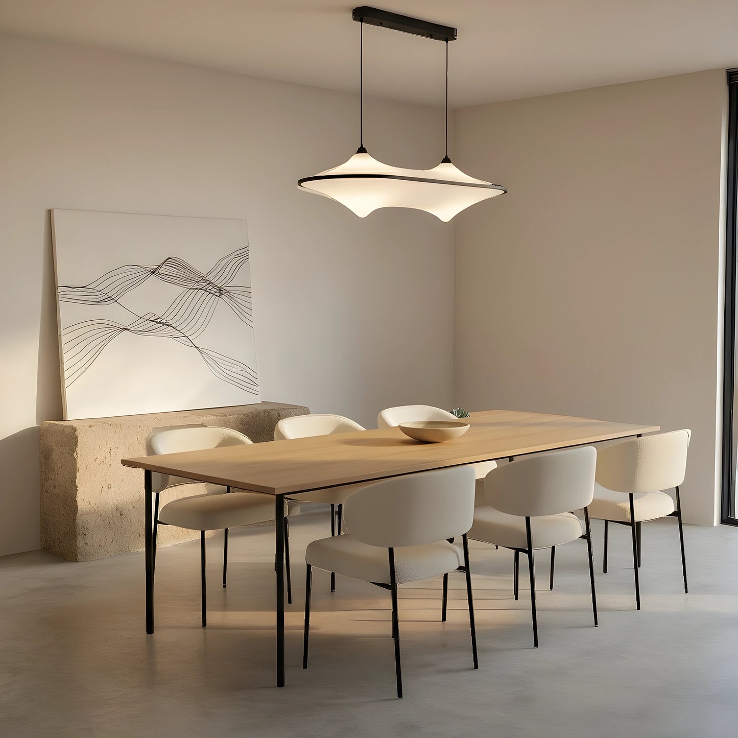 Close up view of the sleek modern iron pendant light fixture showing its minimalist design, smooth finish, and intricate detailing on the frame.