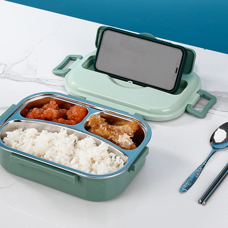 View of a modern stainless steel lunch box with a sleek design, featuring a secure lid and insulated compartments