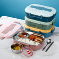 View of a modern stainless steel lunch box with a sleek design, featuring a durable exterior and secure lid