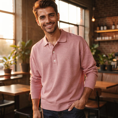 View of a light gray knit polo shirt, featuring a relaxed fit, short sleeves, and a classic collar