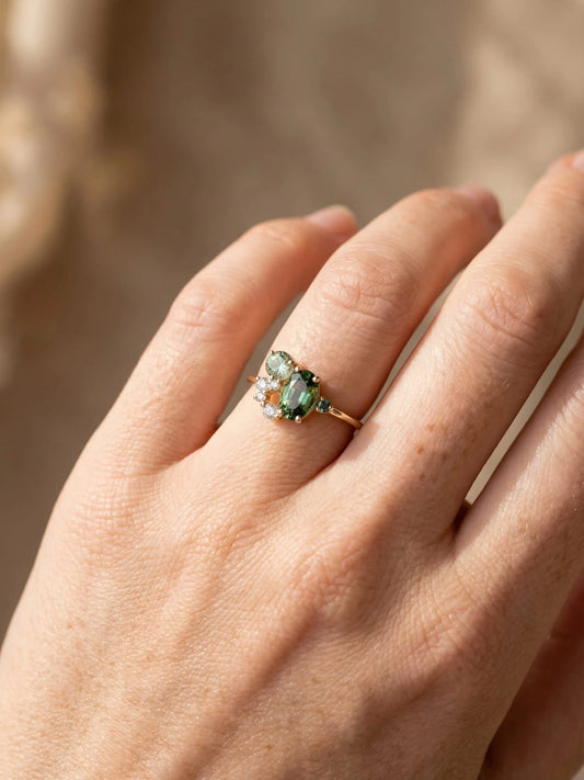 View of an elegant women's ring featuring delicate zircon stones set in a polished silver band, showcasing its refined design