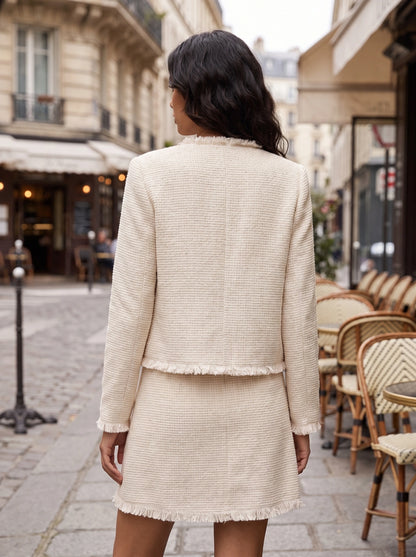 Back view of a model showing the Womens Textured Autumn Jacket in a warm hue, showing its sophisticated construction and tailored fit against a neutral background.