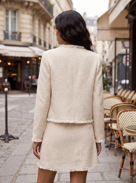 Back view of a model showing the Womens Textured Autumn Jacket in a warm hue, showing its sophisticated construction and tailored fit against a neutral background.