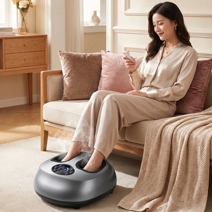 Close up of the Women's Foot Massager showing its luxurious fabric, intricate stitching, and heat function button against a soft, neutral background.