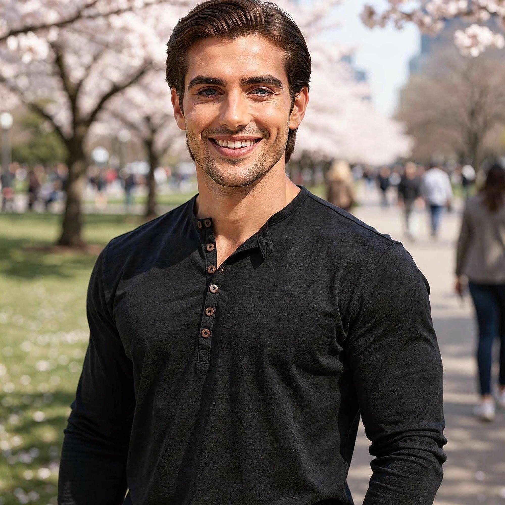 View of a light gray long sleeve henley shirt featuring a buttoned placket and soft cotton fabric