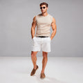 View of athletic fit chino shorts in khaki, made of lightweight cotton with pockets for convenience