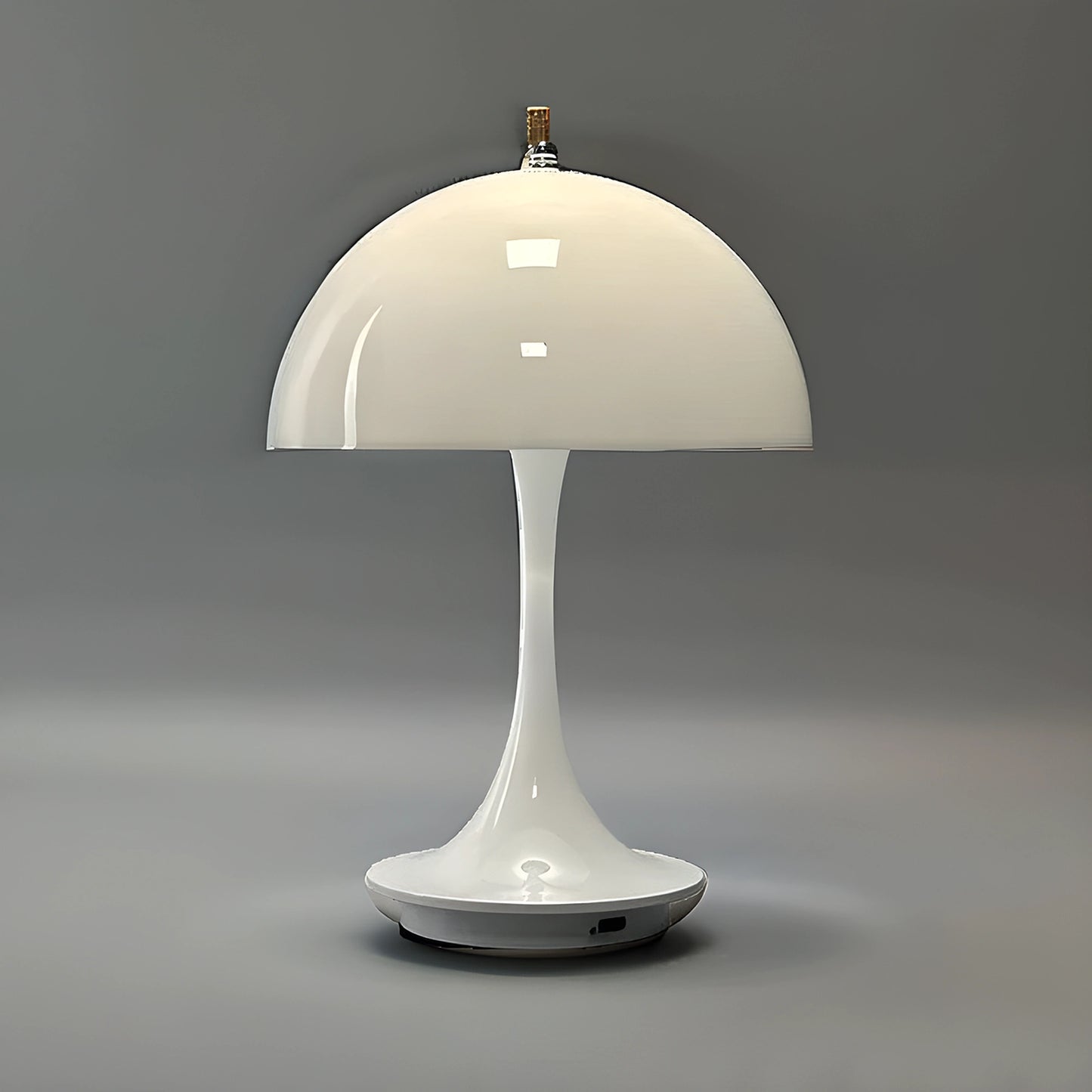 View of a sleek contemporary rechargeable table lamp with a metallic finish and minimalist design, perfect for a foyer
