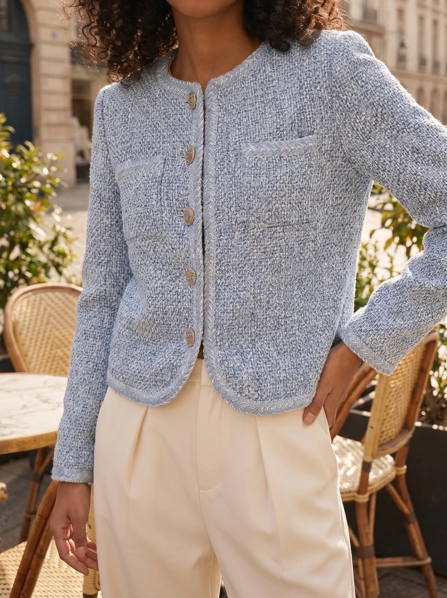 Close up view of the Womens Structured Autumn Jacket showing its rich fabric texture, precise stitching, and design details against a neutral background.