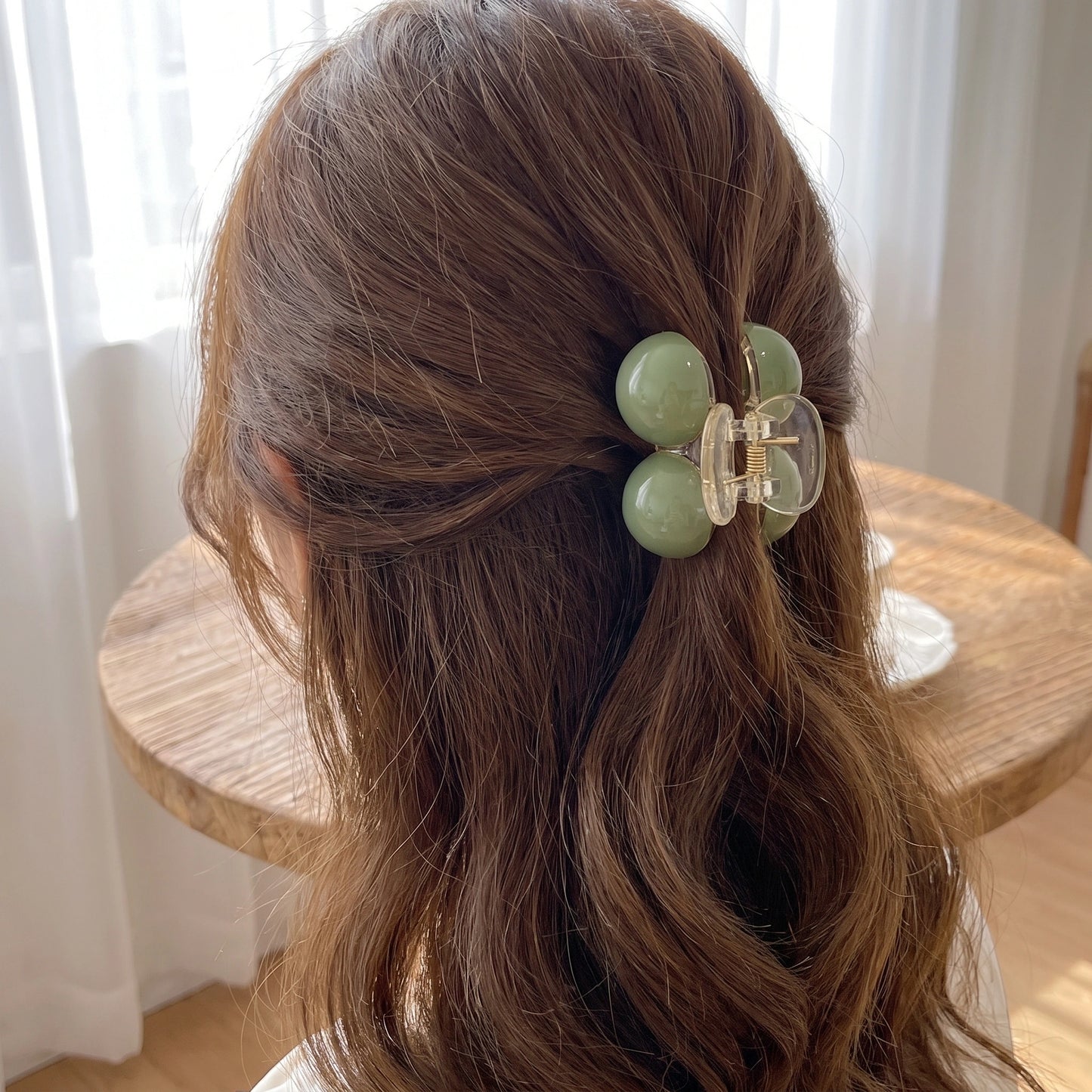 Close up view of the Womens Refined Hair Clip showing intricate detailing and high quality stitching, perfect for enhancing any hairstyle.