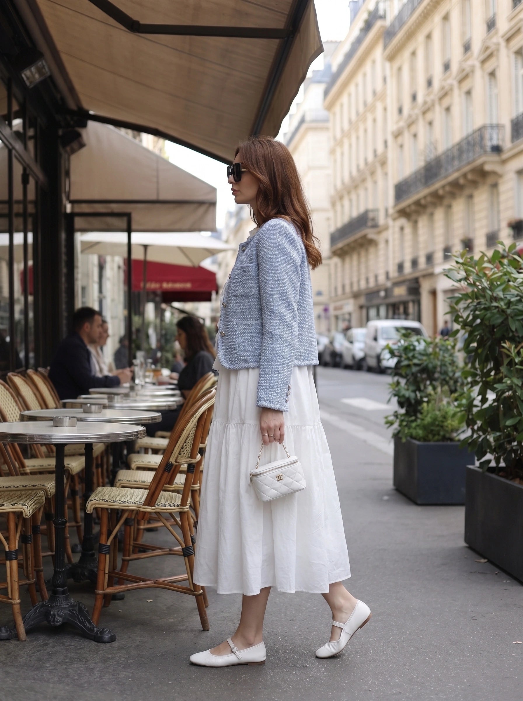 A model showcases the Womens Structured Autumn Jacket in a rich burgundy color, styled with high waisted trousers against a neutral background.