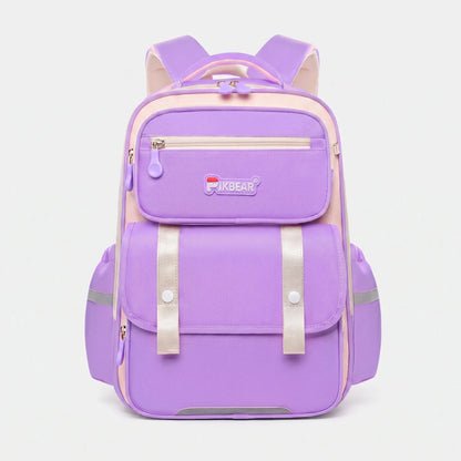 View of a structured ergonomic school backpack in vibrant blue nylon, featuring padded straps and multiple compartments