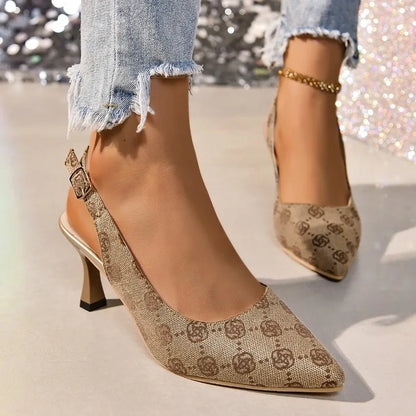 View of elegant summer sandals in soft beige leather with a stylish ankle strap and comfortable flat sole