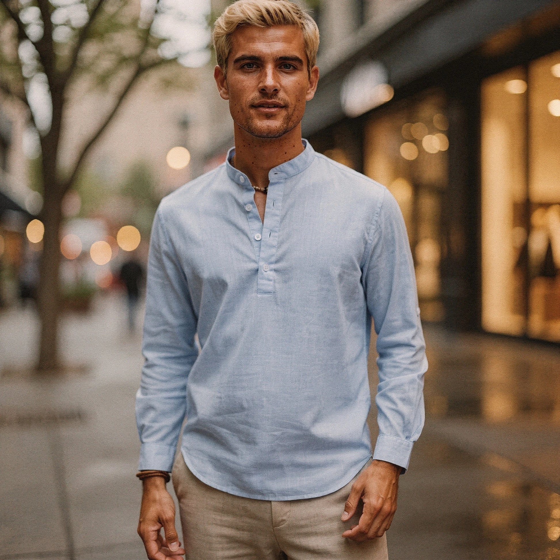 Lightweight casual henley shirt in light gray, featuring a three button placket and long sleeves, view