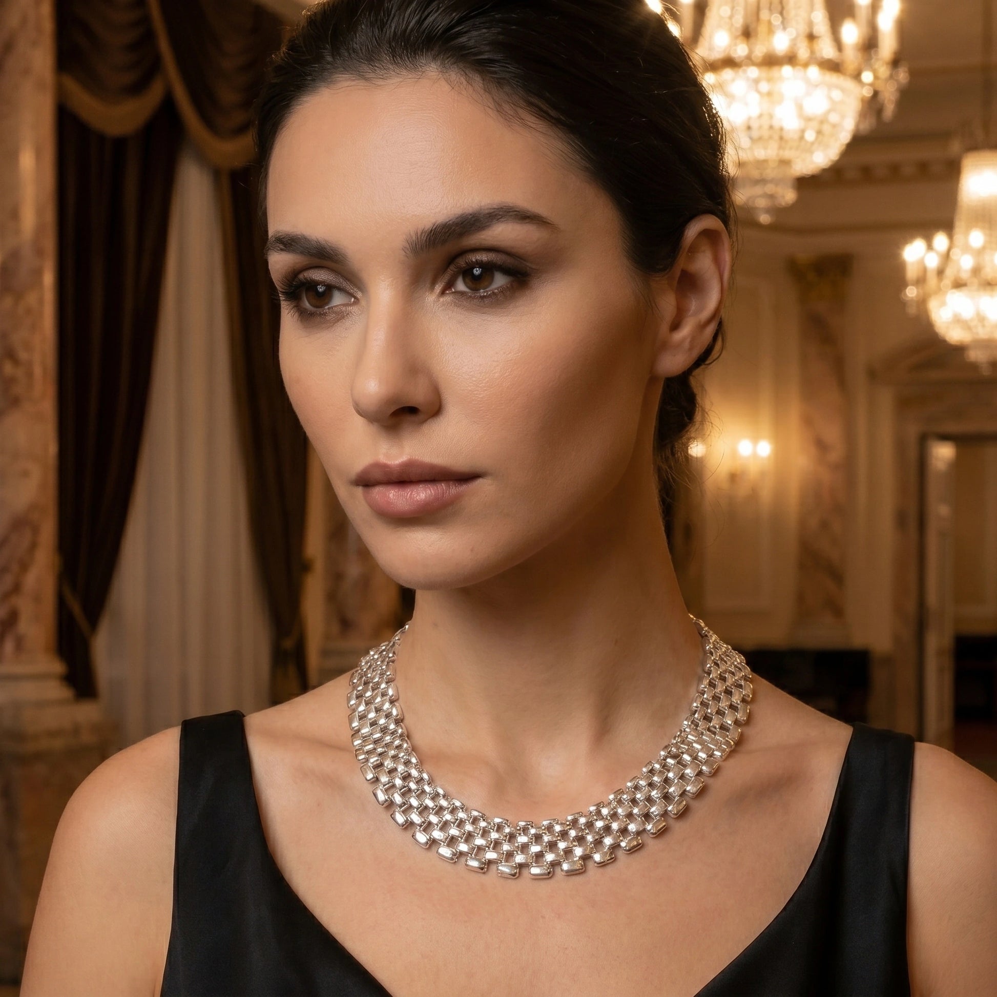 Close up view of the Women's Bold Statement Necklace showing intricate stitching and luxurious fabric details against a soft neutral background.