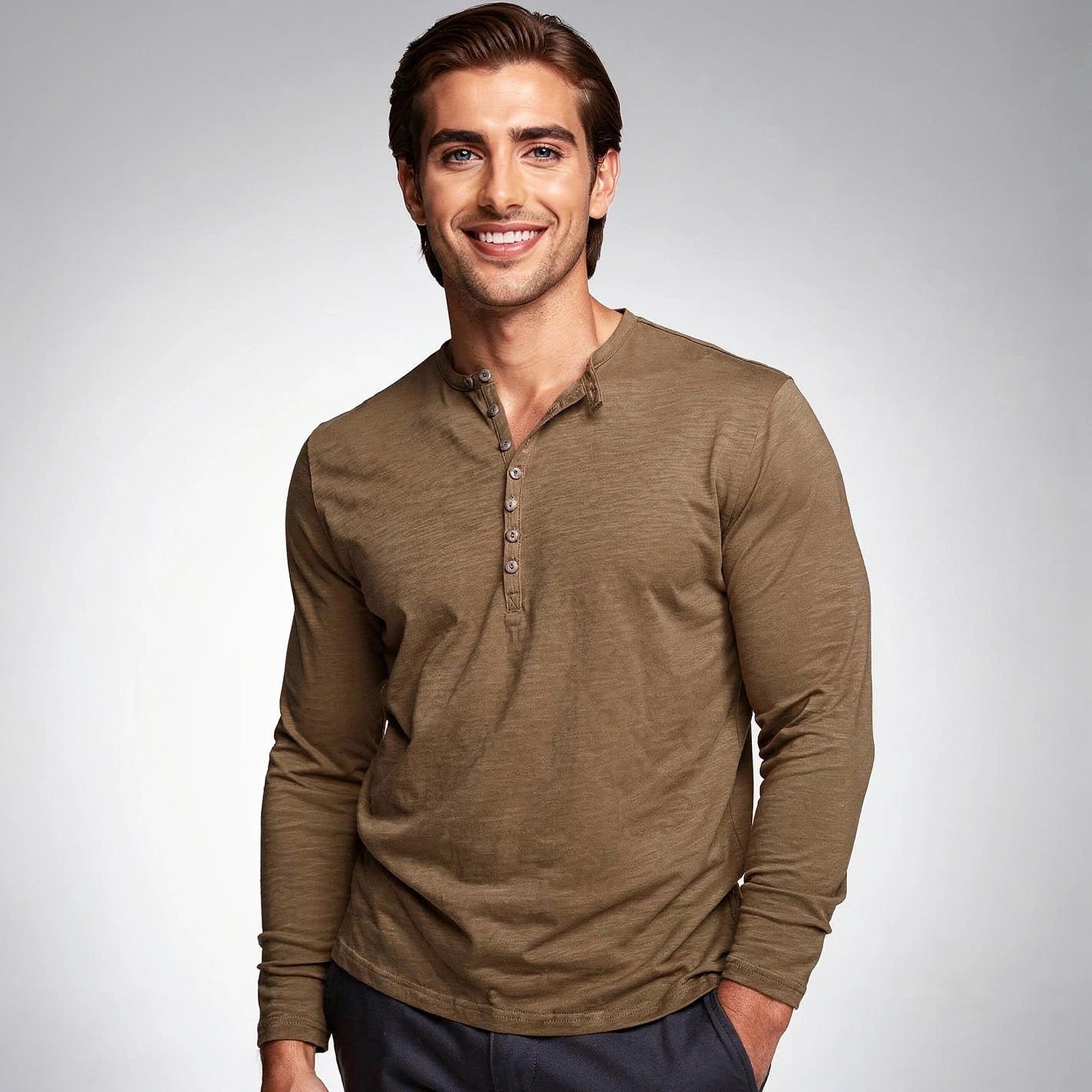 View of a comfortable casual long sleeve henley shirt in soft cotton fabric, featuring a buttoned placket and a relaxed fit