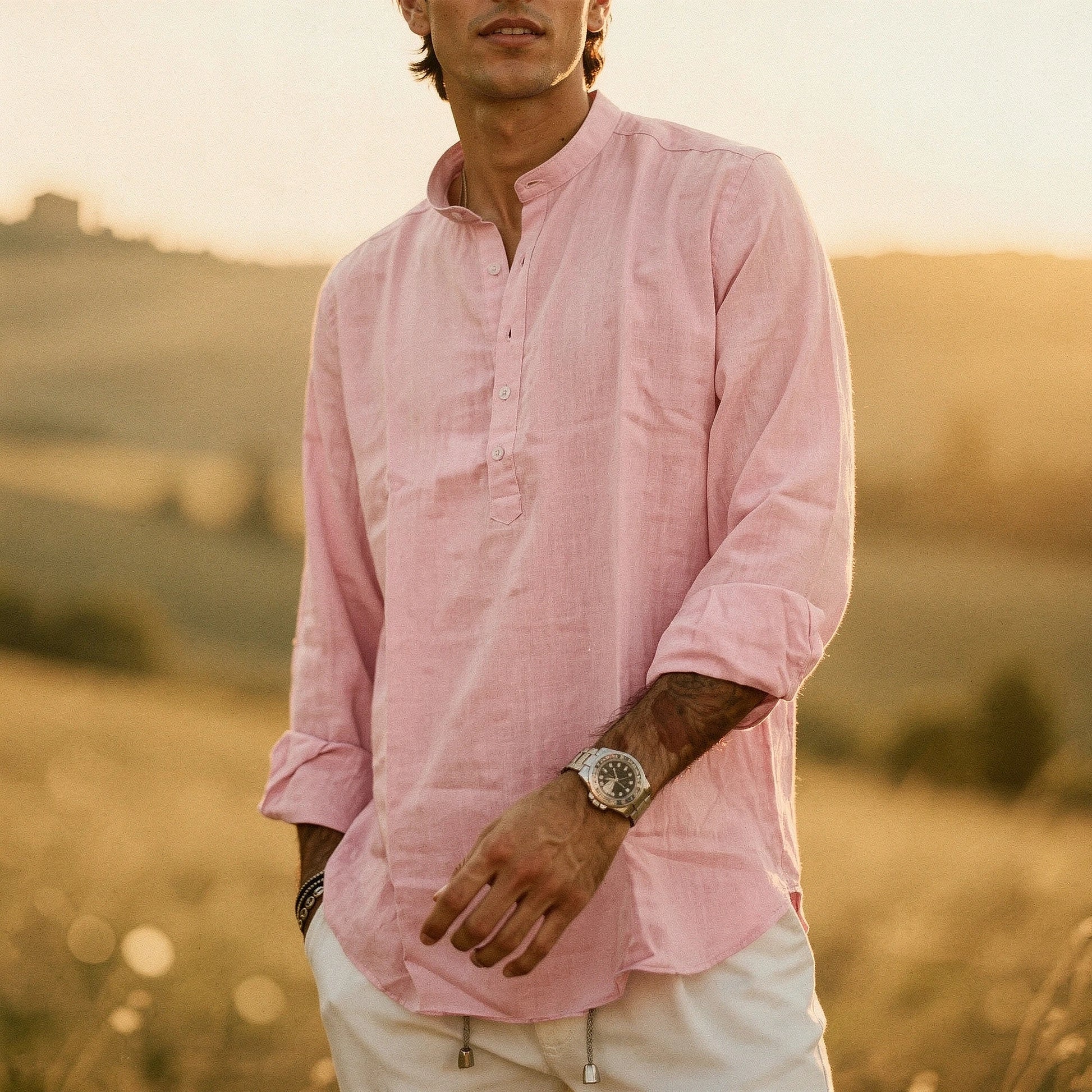 View of a lightweight summer henley shirt in light blue, featuring a three button placket and short sleeves