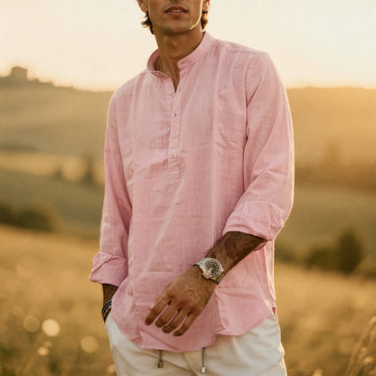 View of a lightweight summer henley shirt in light blue, featuring a three button placket and short sleeves