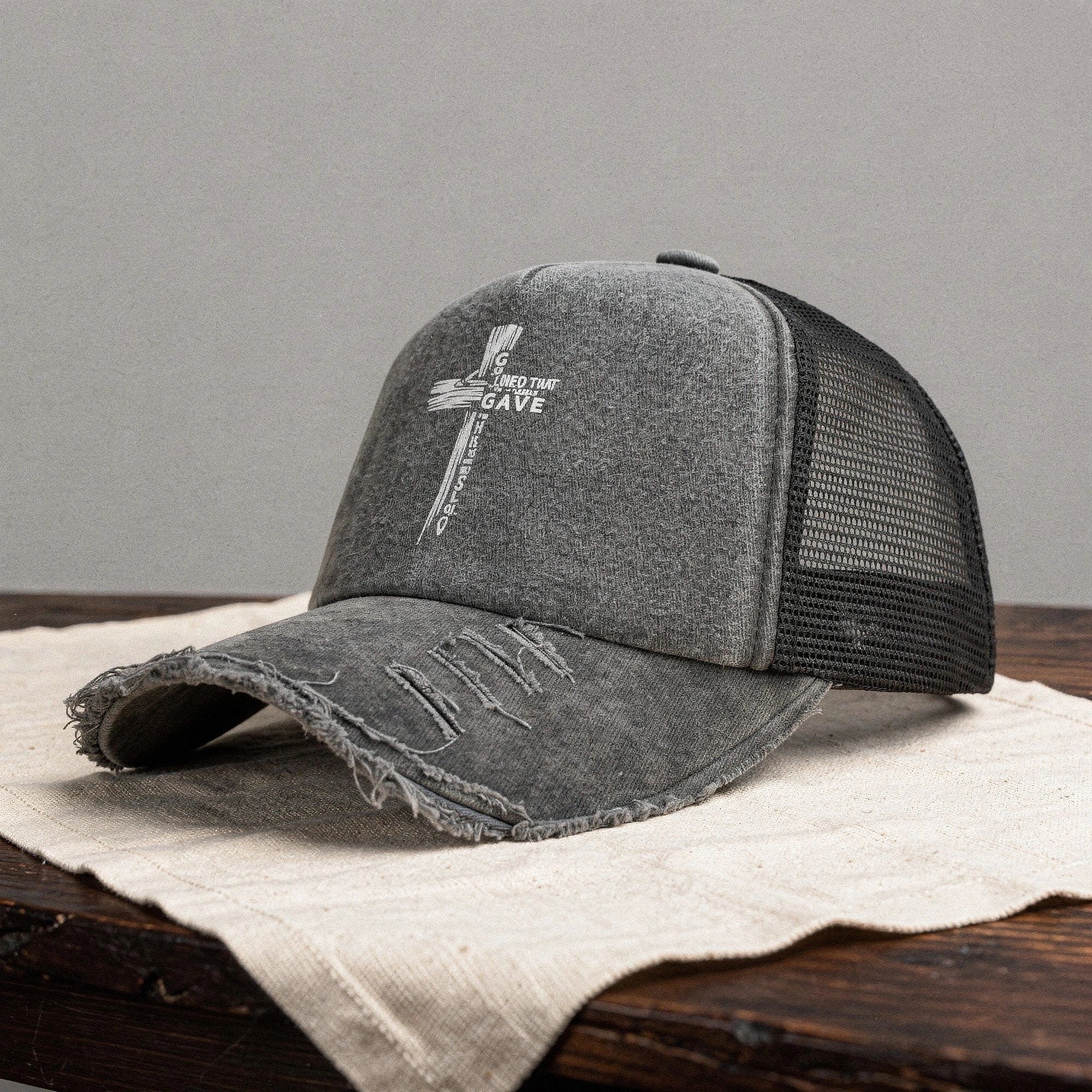Light pink summer baseball cap made of breathable fabric, featuring a curved brim and adjustable strap, detailed view