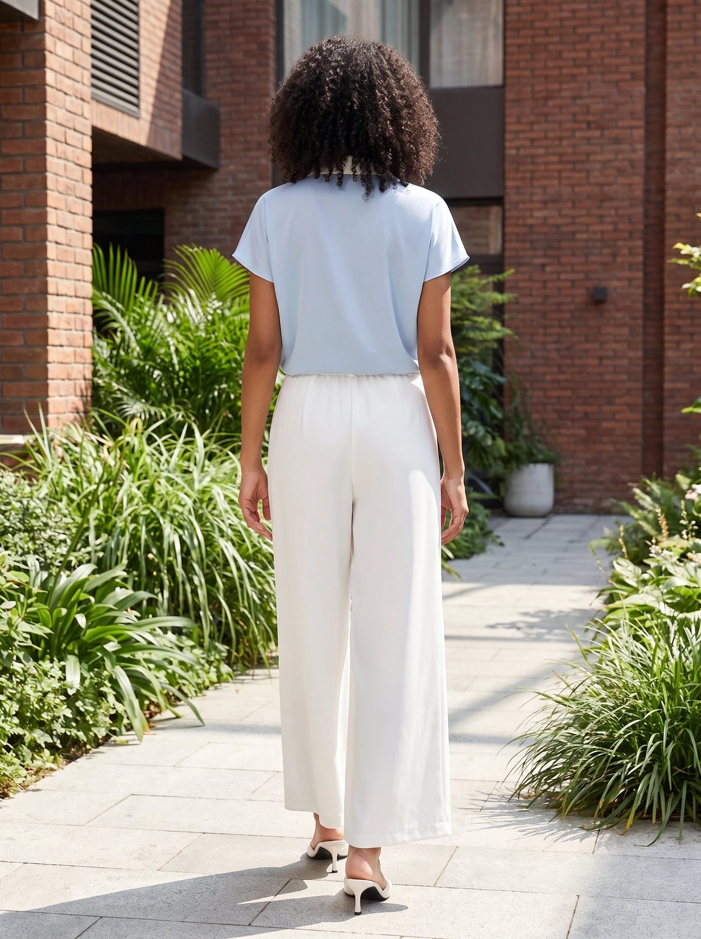 Close up view of the Womens Effortless Spring Pants showing the soft fabric texture and precise stitching, showing their relaxed ankle length design.