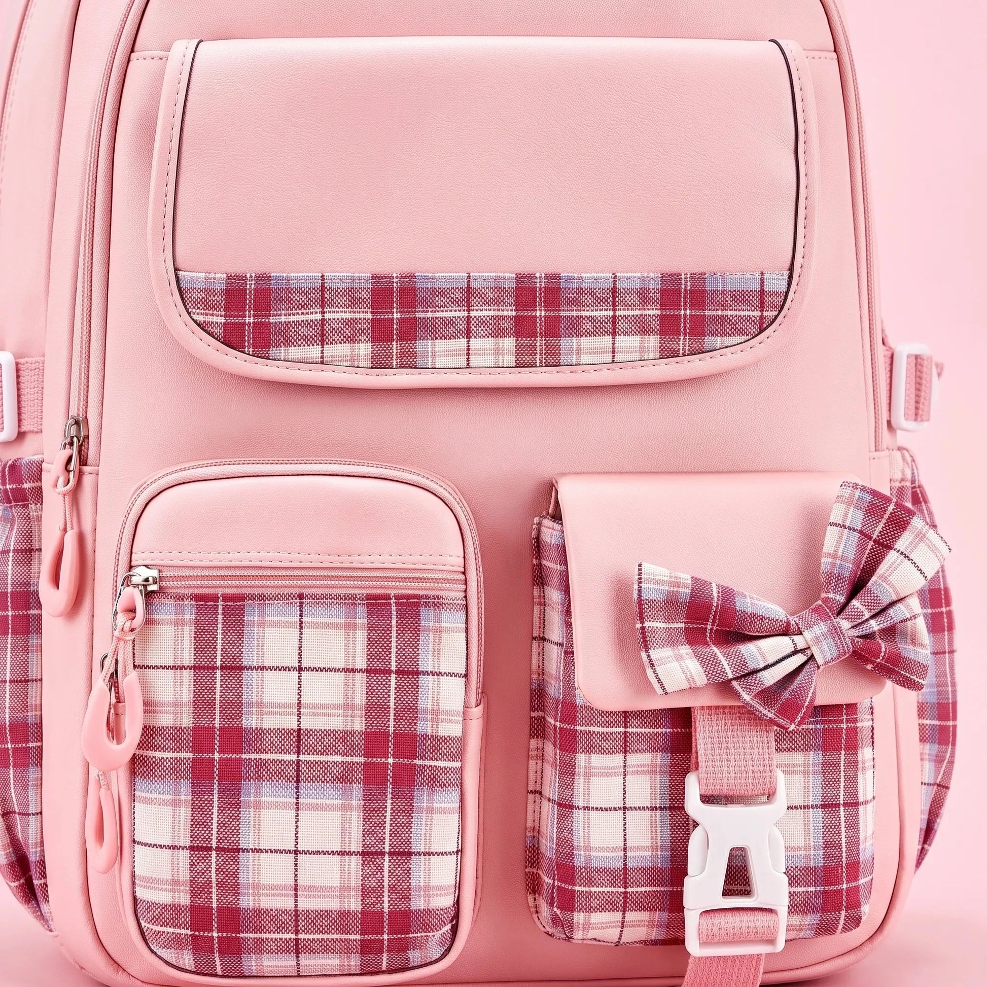 View of a stylish checkered school backpack featuring padded shoulder straps and a spacious compartment