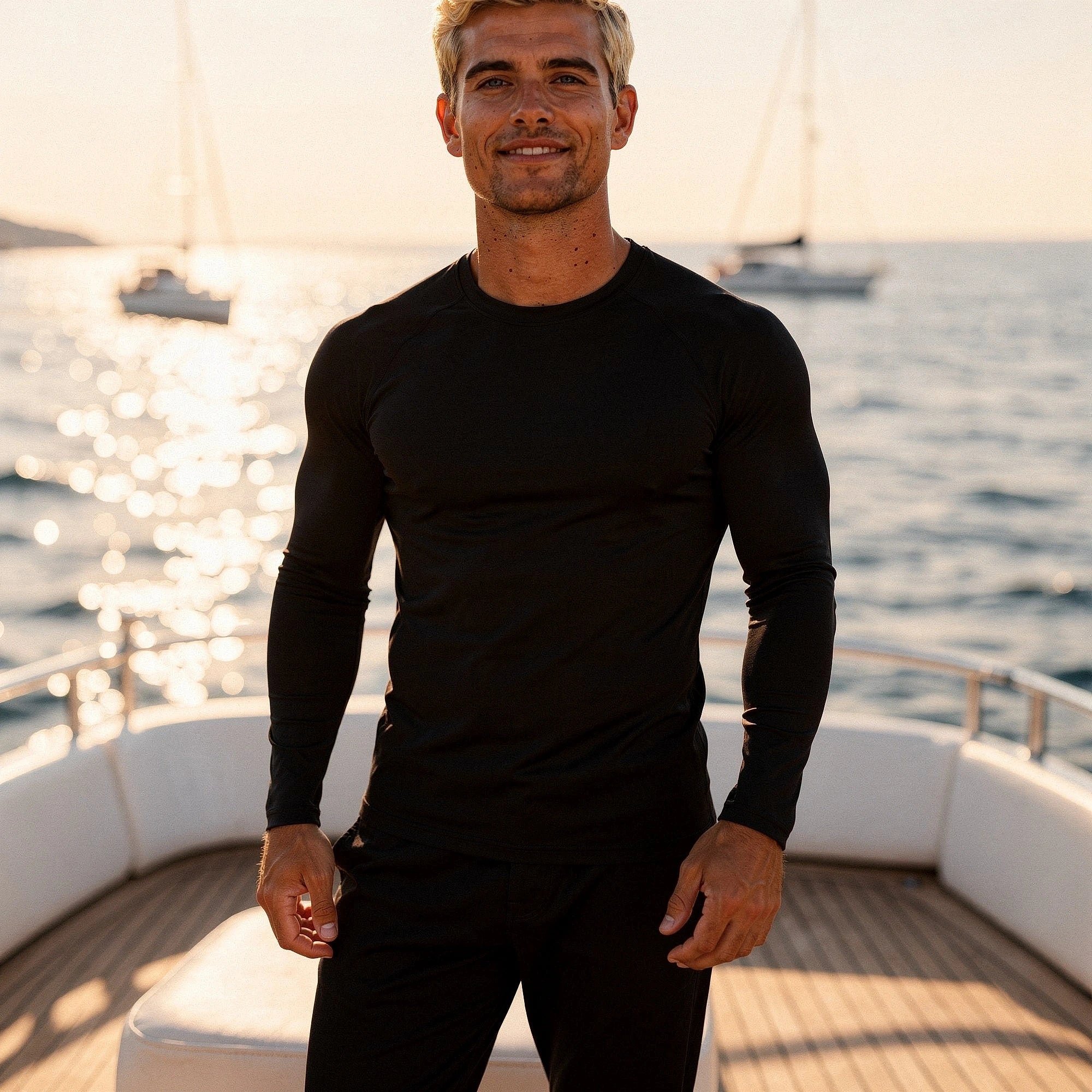 View of a black fleece backed winter tee featuring a snug fit and moisture wicking fabric, highlighting the texture and stitching