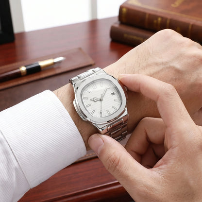 Close up view of the square steel band watch showing its intricate detailing, polished finish, and precise stitching against a neutral background.