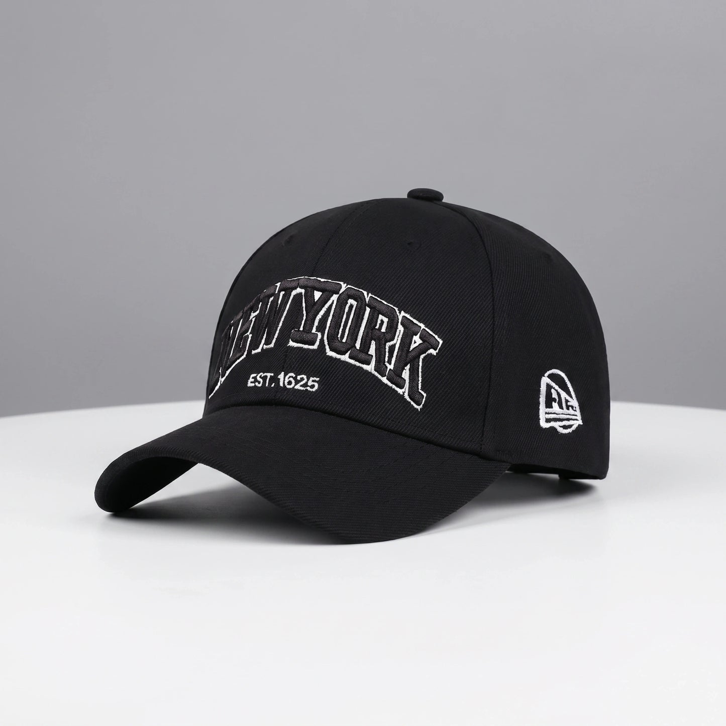 Close up view of the adjustable polyester baseball cap showing its durable fabric, precise stitching, and modern design, perfect for outdoor adventures.