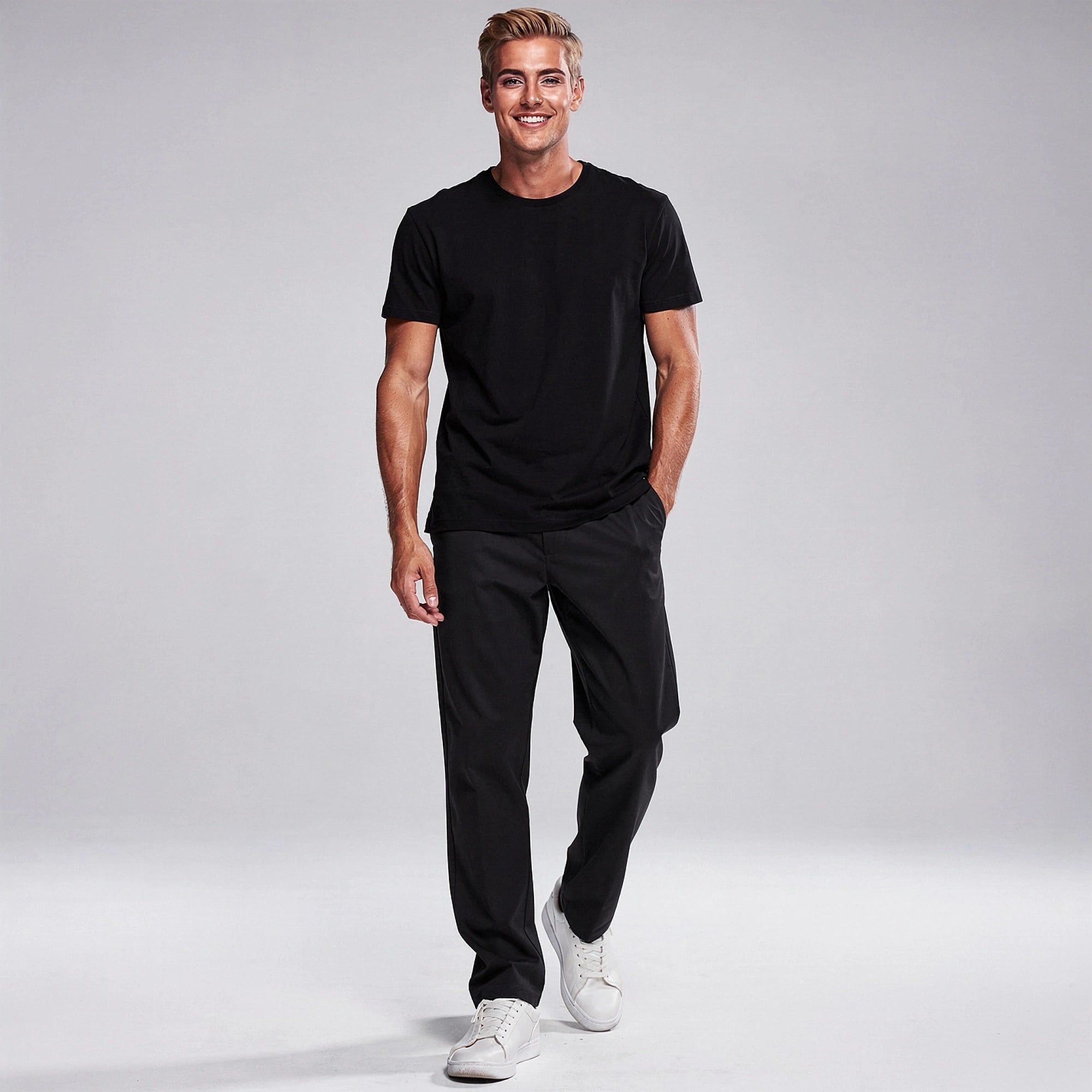 View of comfortable loose fit formal trousers in charcoal gray, featuring a smooth fabric and tailored waistband