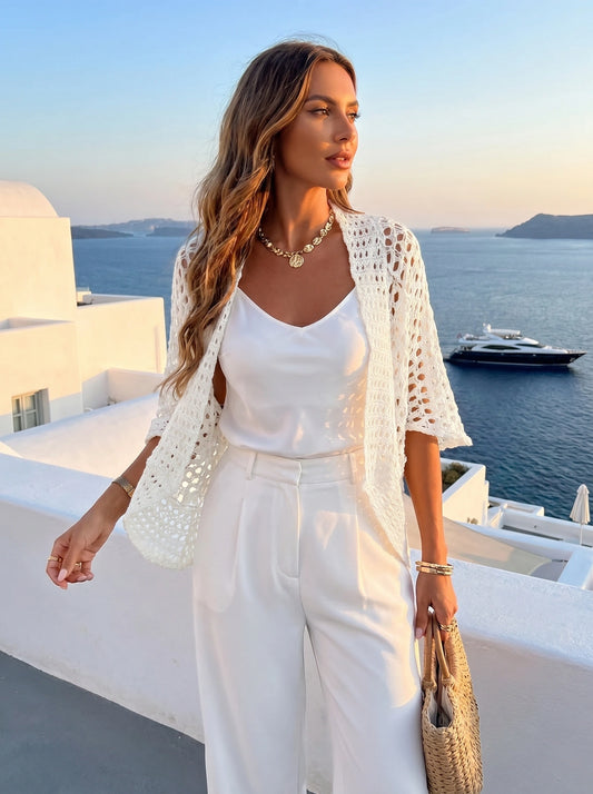 Close up view of the Womens Relaxed Summer Cardigan showing the soft fabric texture and delicate stitching details against a neutral background.