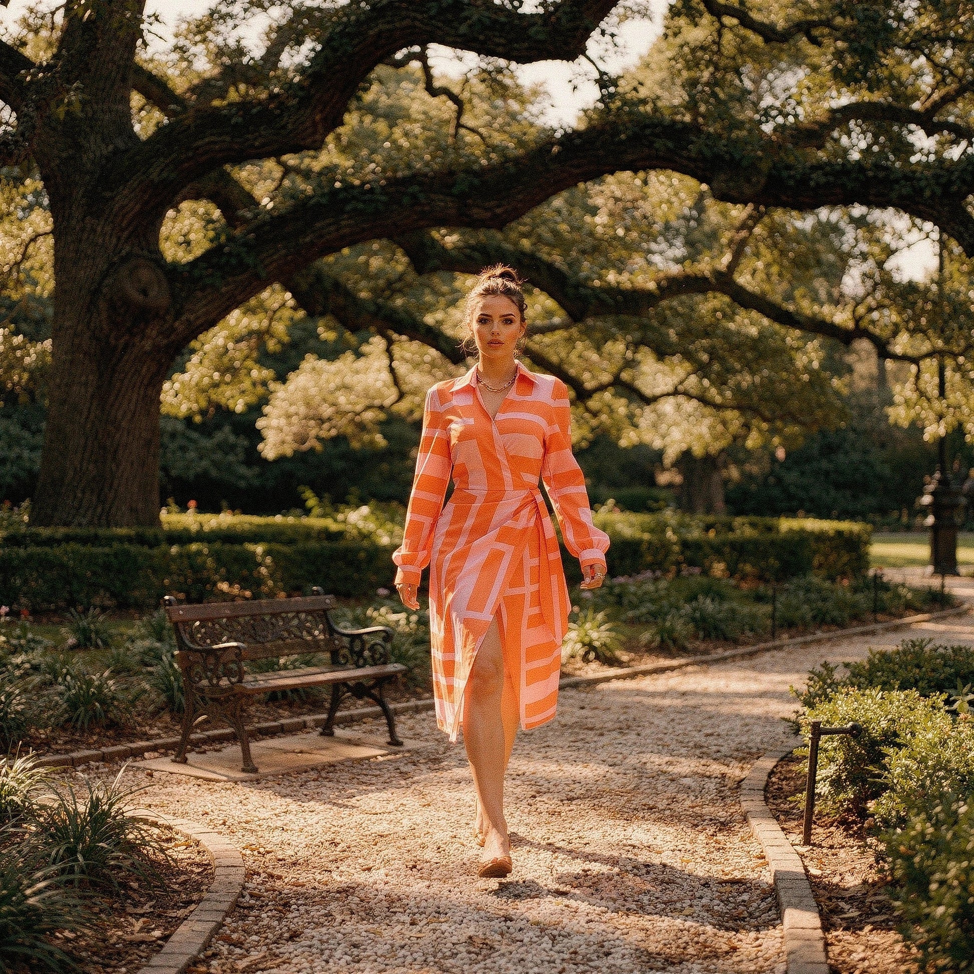 View of a women's wrap dress featuring a vibrant floral print in shades of blue and pink, with a flattering silhouette
