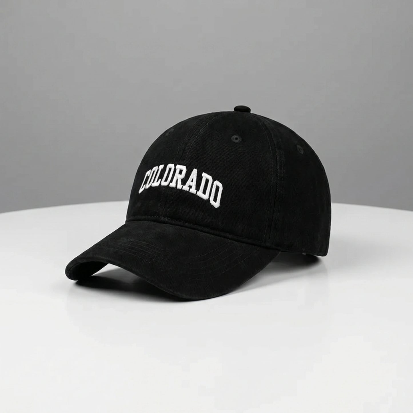 Close up view of the CanyonPeak baseball cap showing its durable fabric, precise stitching, and adjustable strap, perfect for outdoor adventures.