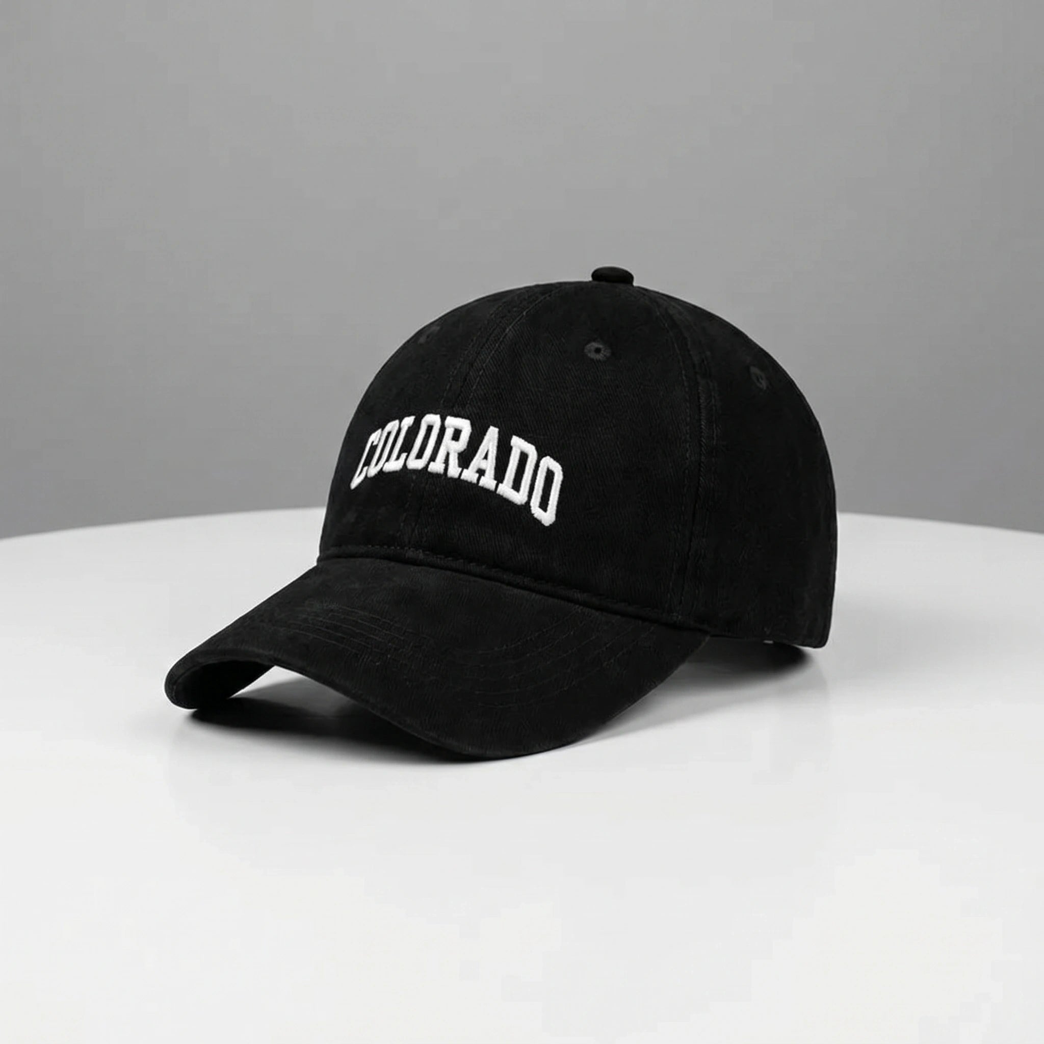 Close up view of the CanyonPeak baseball cap showing its durable fabric, precise stitching, and adjustable strap, perfect for outdoor adventures.