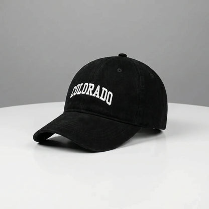 Close up view of the CanyonPeak baseball cap showing its durable fabric, precise stitching, and adjustable strap, perfect for outdoor adventures.