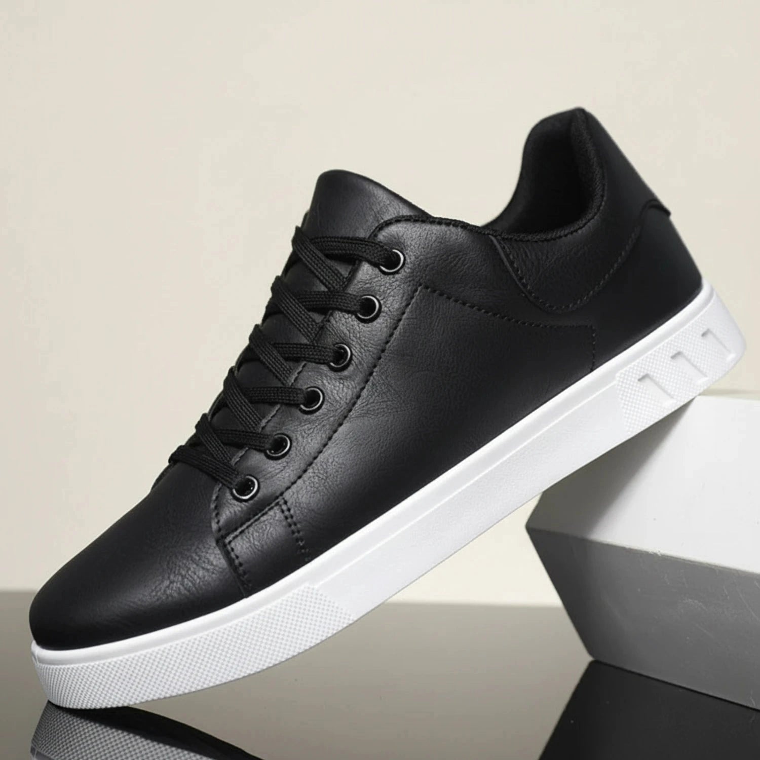 View of stylish men's casual shoes in dark brown leather with a comfortable design and textured sole