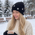 Close up view of the women's cozy sparkly winter beanie showing the intricate stitching and soft texture, perfect for adding elegance to cold weather outfits.