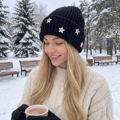 Close up view of the women's cozy sparkly winter beanie showing the intricate stitching and soft texture, perfect for adding elegance to cold weather outfits.