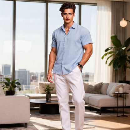 Light blue relaxed fit short sleeve shirt made of soft cotton, featuring a button down collar and chest pocket, view