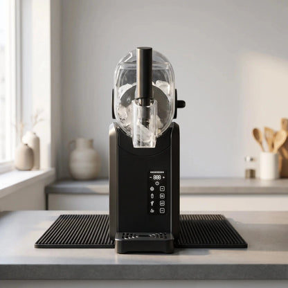 Sleek countertop slush machine with a clear bowl, digital control panel, and vibrant slush creations on display