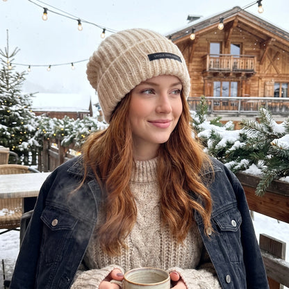 Close up view of the soft, textured knit fabric of the Womens Cozy Slouchy Winter Beanie, showing intricate stitching details and a warm, inviting color.