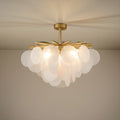 A full front view of the Layered Glass Chandelier, showing its design and sculptural glow, ideal for contemporary dining rooms.