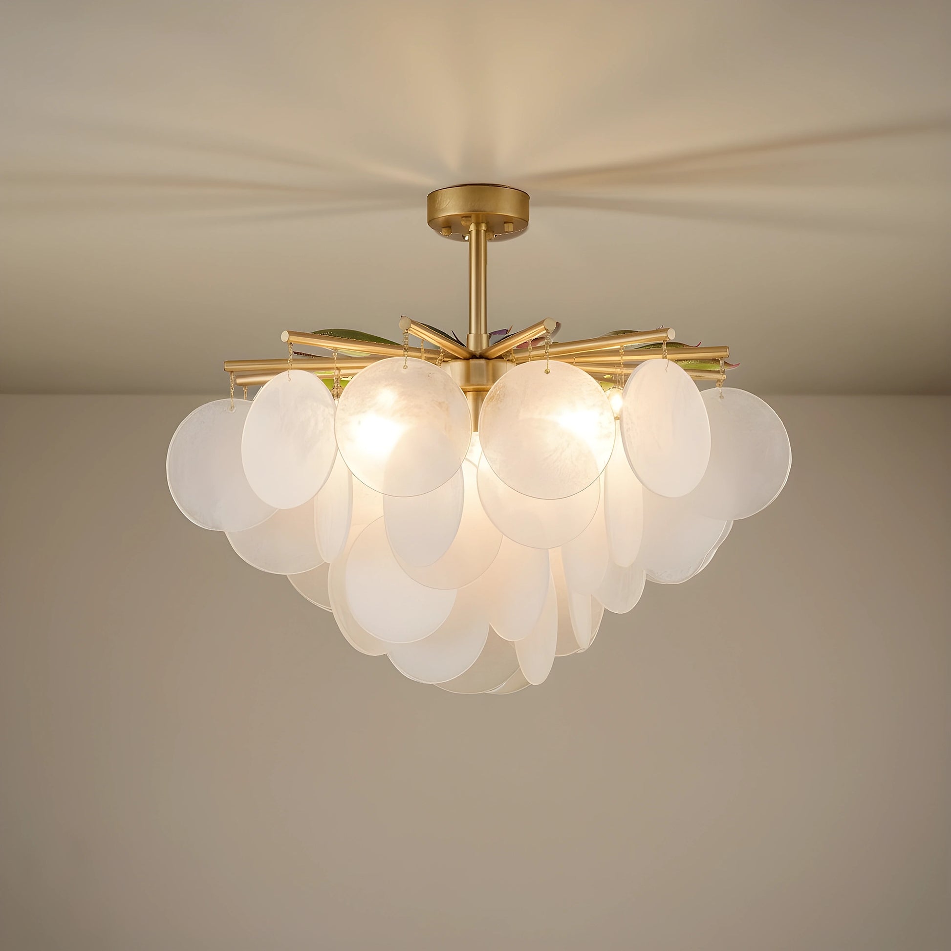 A full front view of the Layered Glass Chandelier, showing its design and sculptural glow, ideal for contemporary dining rooms.