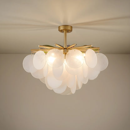 A full front view of the Layered Glass Chandelier, showing its design and sculptural glow, ideal for contemporary dining rooms.