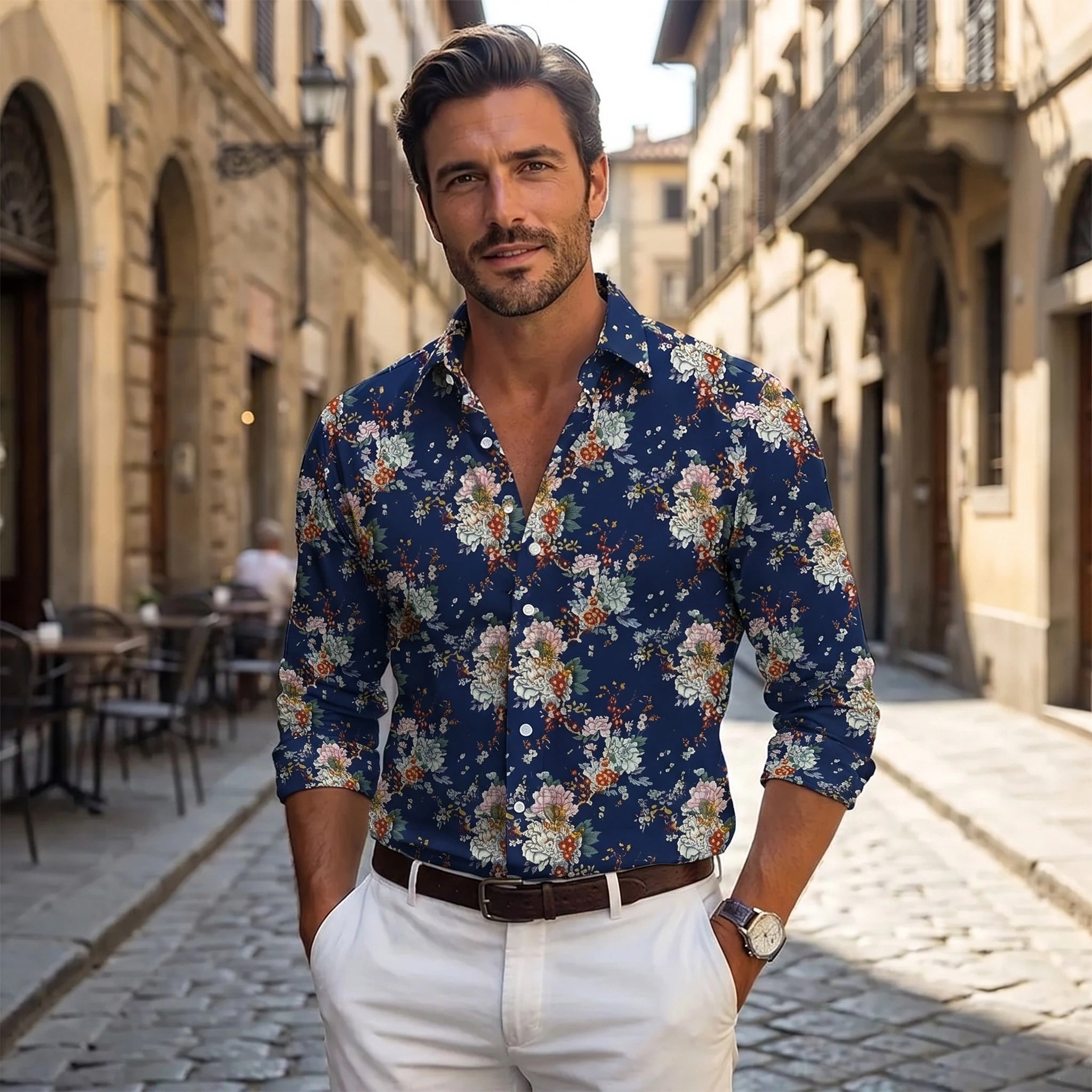 A model showcases the Mens Relaxed Floral Autumn Shirt in a vibrant floral pattern, styled with complementary pieces against a neutral background for a casual yet look.