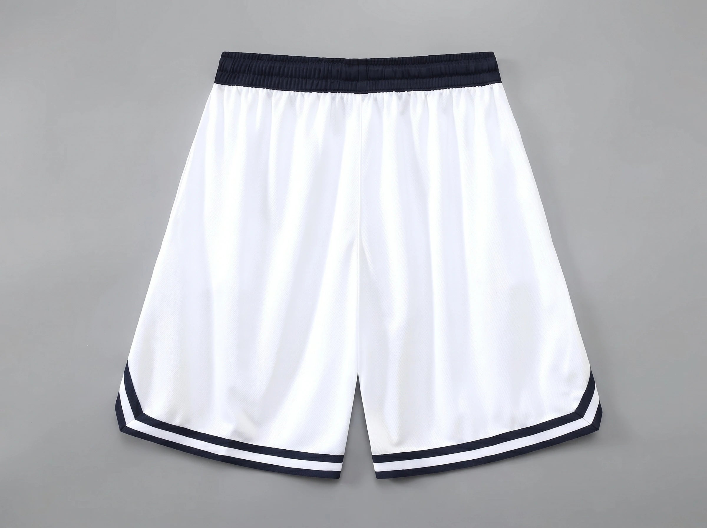 Close up view of the breathable fabric and precise stitching of men's athletic lightweight summer shorts, showing their quality and design for active lifestyles.